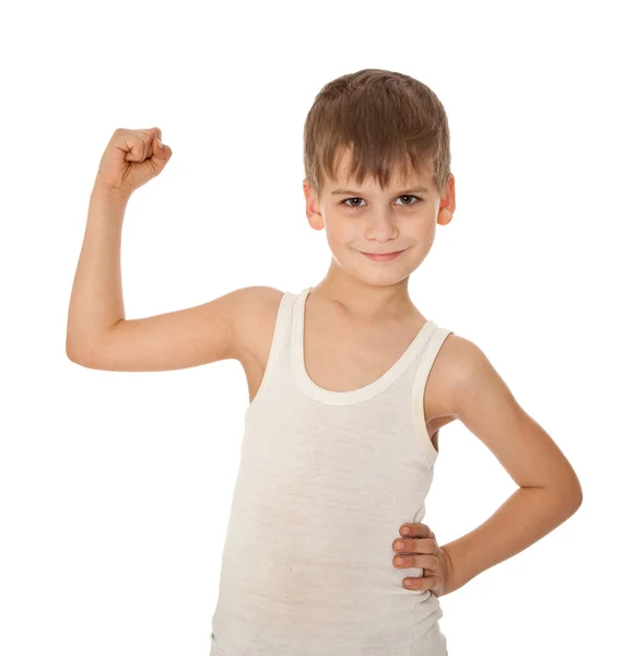 Menino mostrando seu músculo — Fotografia de Stock