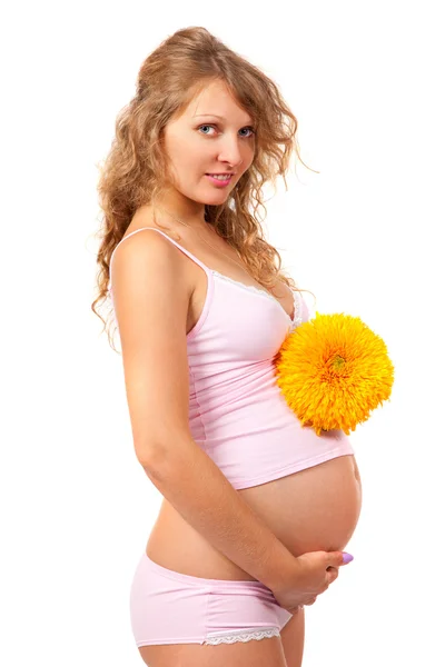 Pregnant woman is caressing her belly — Stock Photo, Image