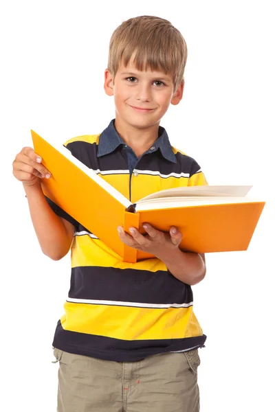 School jongen houdt een boek — Stockfoto