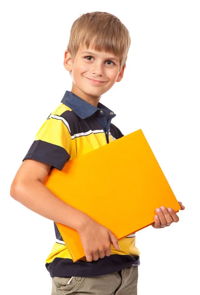 Skola pojke håller en bok — Stockfoto