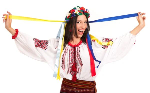 Attractive woman wears Ukrainian national dress is holding ukrai — Stock Photo, Image