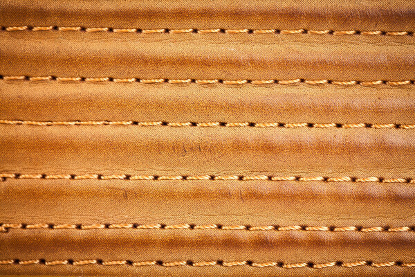 Leather stitched by threads