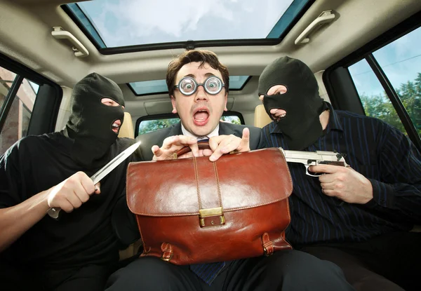 Businessman grasped in hostages. — Stock Photo, Image