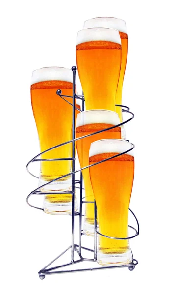 Six glasses beer on stand