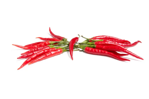 Nádherné červené papriky na bílé. — Stock fotografie