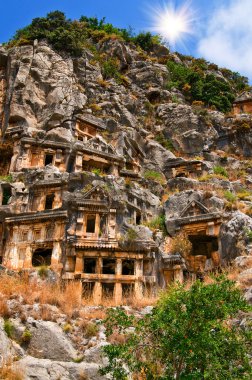 Tombs high in the mountains and blue sky. clipart