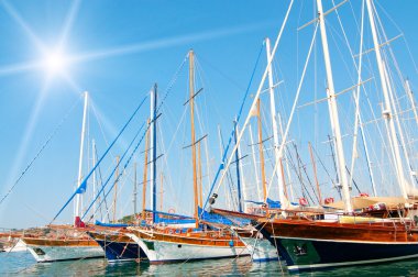 Yachts on the harbor. clipart