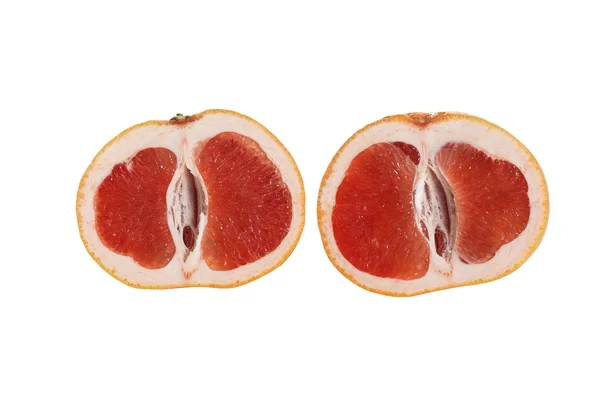 Bitar av saftig grapefrukt på en vit. — Stockfoto