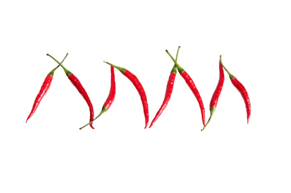 Plezier rode paprika's op een wit. — Stockfoto