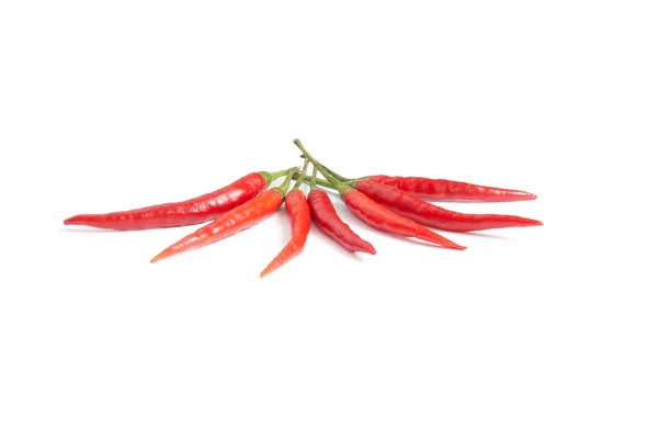 Zralé, červené papriky na bílé. — Stock fotografie