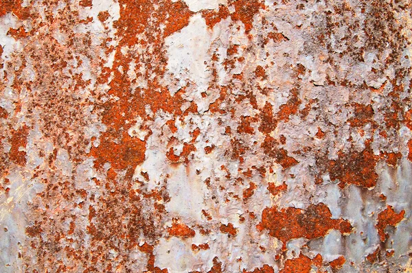 Geoxideerde metaalplaat bedekt met oude verf. — Stockfoto