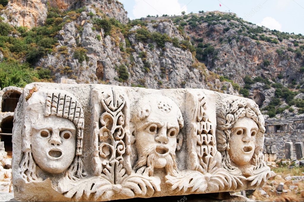 Ancient,abandoned masks and tombs in Myra.Turkey.