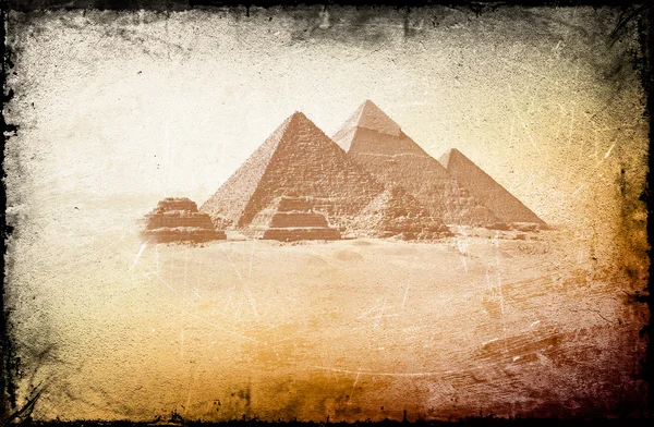 Vintage achtergrond met Egyptische piramiden — Stockfoto