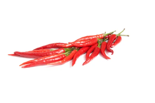 Fresh,ripe group of peppers on a white. — Stock Photo, Image
