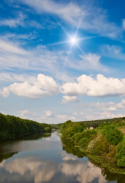 Small river and sun in the blue sky. — Stock Photo, Image