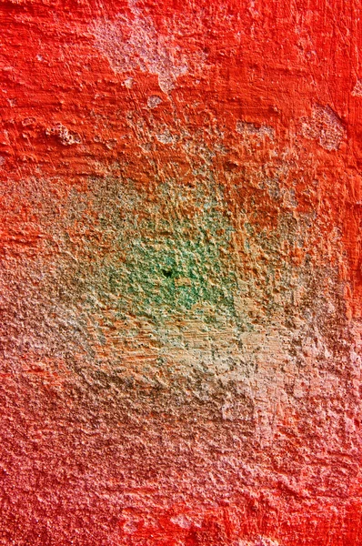 Dirty old wall covered color paints. — Stockfoto