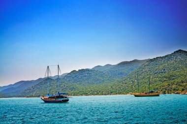 Wonderful yachts in the bay. Turkey. Kekova. clipart