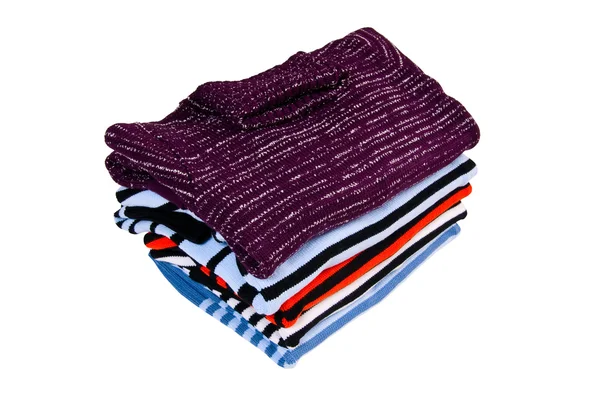 Cómodos suéteres coloridos en un blanco . —  Fotos de Stock