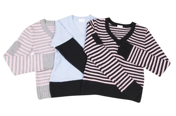Three trendy colorful sweaters on a white — Stock Photo, Image