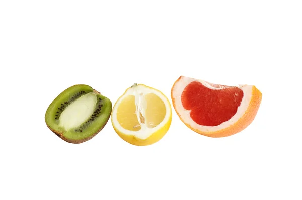 Bitar av citron, kiwi och grapefrukt. — Stockfoto