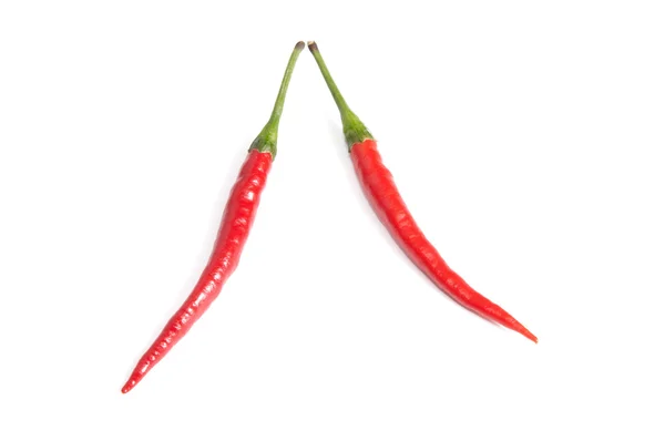 Plezier rode paprika's op een wit. — Stockfoto