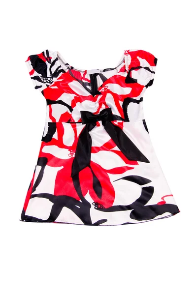 Schimmerndes stilvolles rot-weißes Kleid auf weißem. — Stockfoto