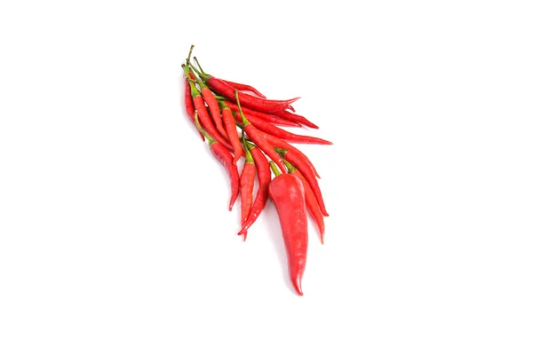 Smakelijke rode paprika's op een witte achtergrond. — Stockfoto