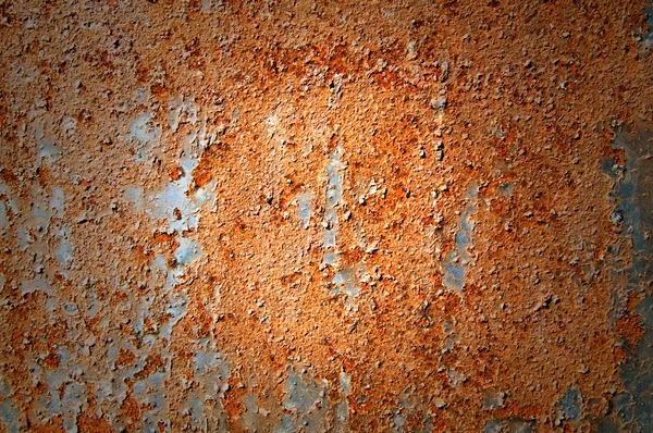 Oxidized metal sheet covered with old paint . — Stock Photo, Image