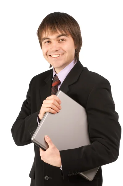 Vriendelijke jonge zakenman op witte achtergrond glimlachend en holdi — Stockfoto