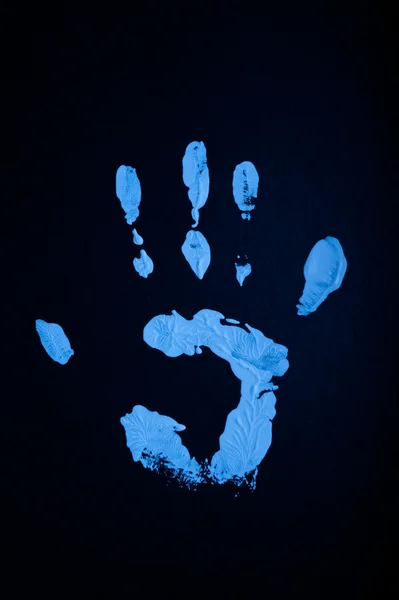 stock image Handprint white paint under UV