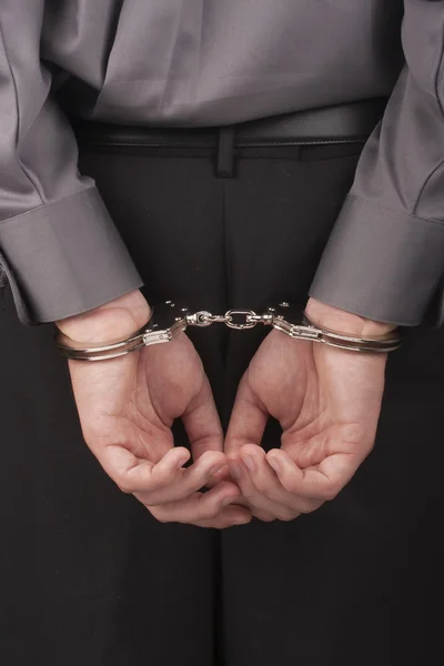 Arrested in handcuffs — Stock Photo, Image