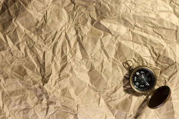 Brązowy papier z kompasem — Zdjęcie stockowe