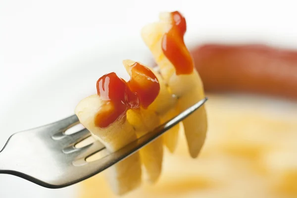 Pomme de terre frite sur une fourchette — Photo