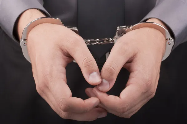 Arrest handcuffs — Stock Photo, Image