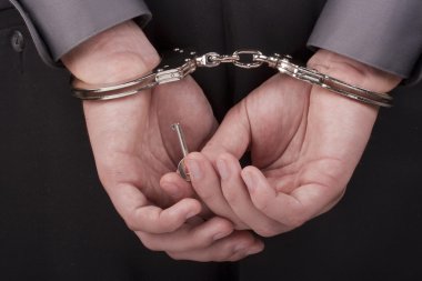 Arrested in handcuffs clipart