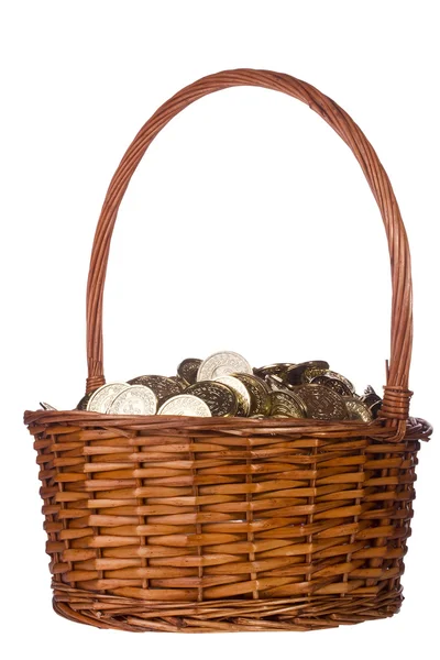 Monedas en una cesta — Foto de Stock