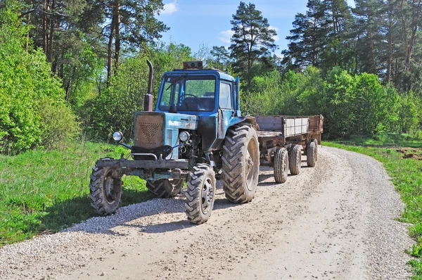 stock image Tractor on forest road