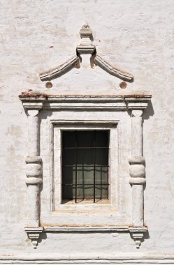 Vintage window in ancient monastery clipart