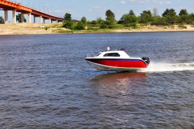 Speed boat on a river clipart