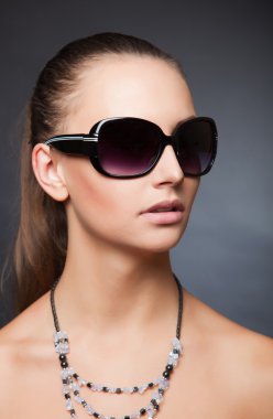 Gorgeous look with sunglasses clipart