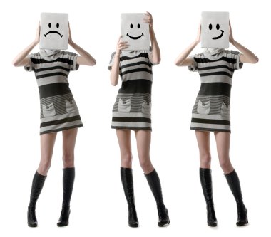 Tree girls holding happy and sad face masks symbolizing changing clipart