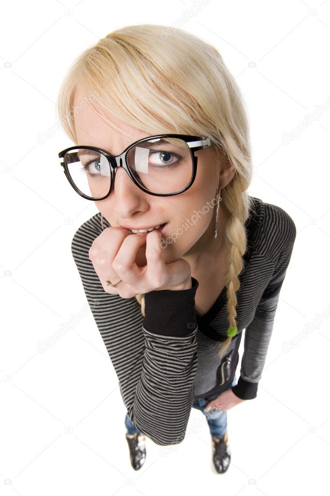 Pretty young woman with glasses looks like as nerdy girl, humor