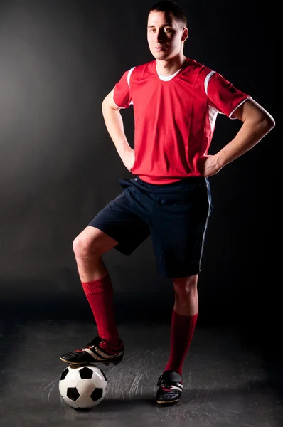 Soccer player in dark — Stock Photo, Image