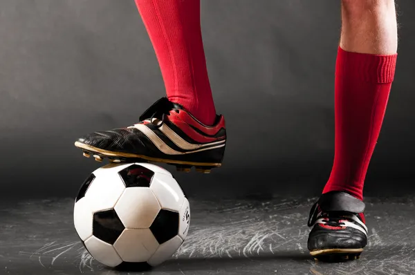 Gambe del giocatore di calcio — Foto Stock