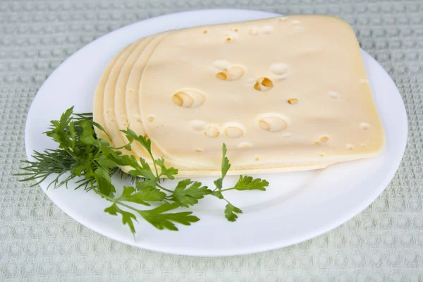 Placa con trozos de queso — Foto de Stock