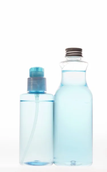 Two bottles with facilities on the care of body — Stock Photo, Image