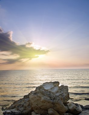 Deniz ve gün batımı, rock.