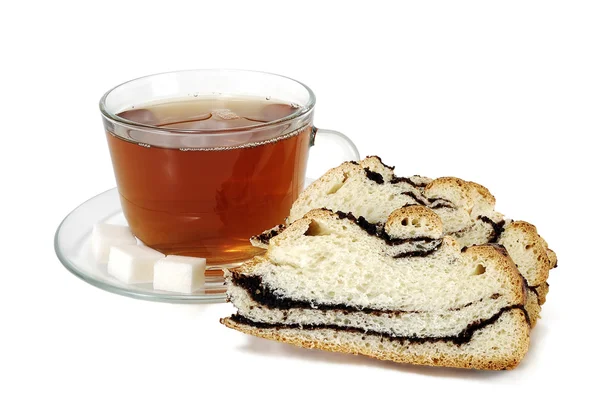 Cup of tea with a papaverous roll — Stock Photo, Image