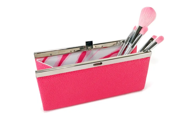 Öppna handväska med kosmetikborstar — Stockfoto