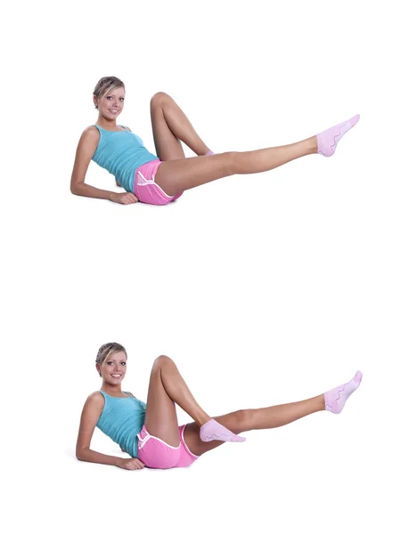 Young woman doing exercises for abdominal prelum Stock Photo
